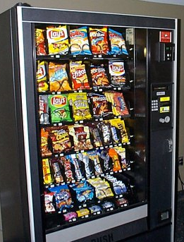 school vending machine filled with high sugar foods and drinks